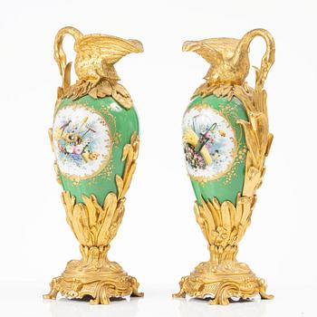 A pair of Louis XV-style gilt bronze and porcelain decorative ewers, France, later part 19th century.