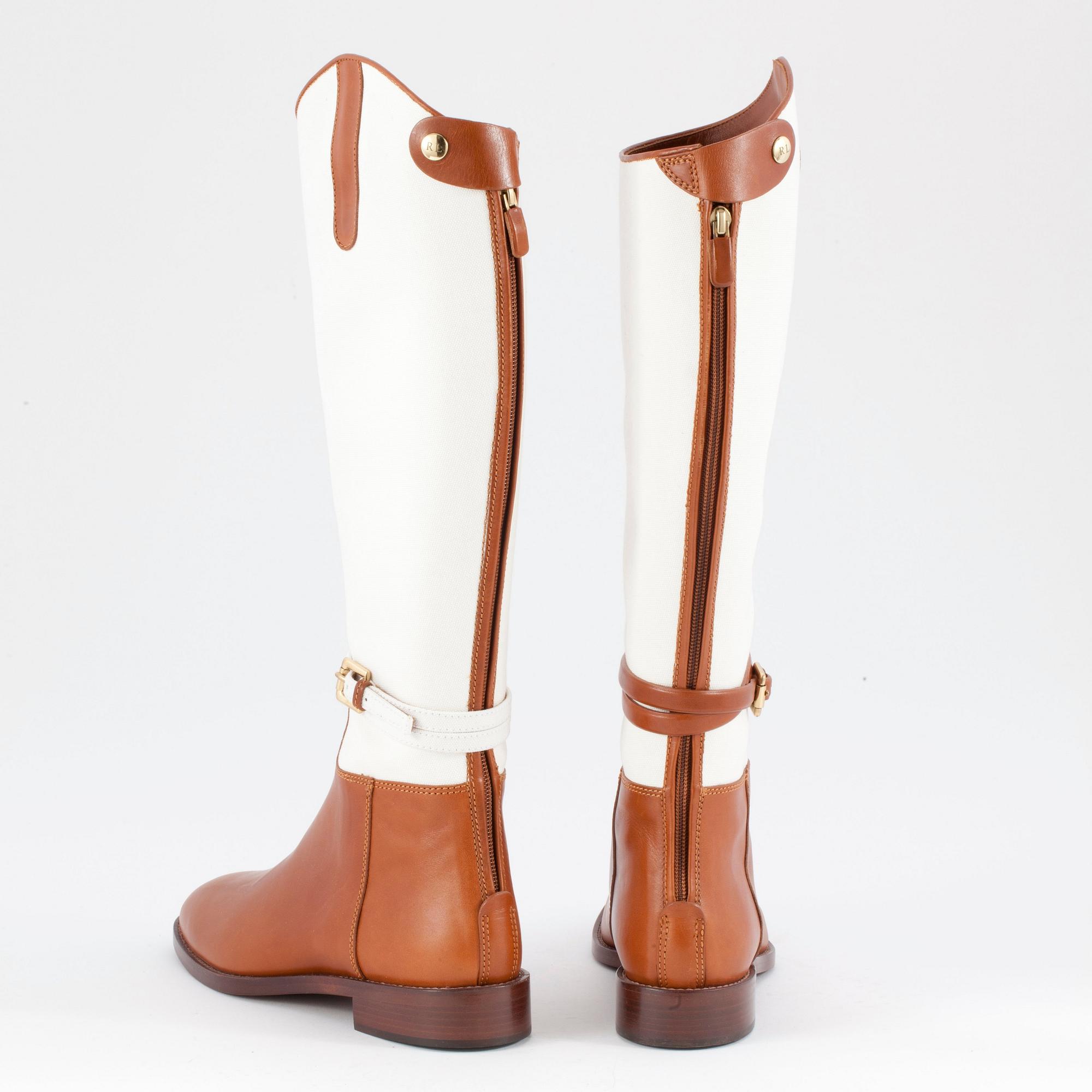 RALPH LAUREN, a pair of white canvas and leather boots. Size US 8.