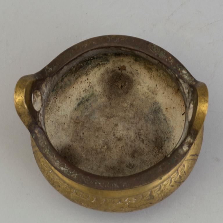 A Chinese early 20th century gilt-bronze censer, with Xuandes six character mark to the base.