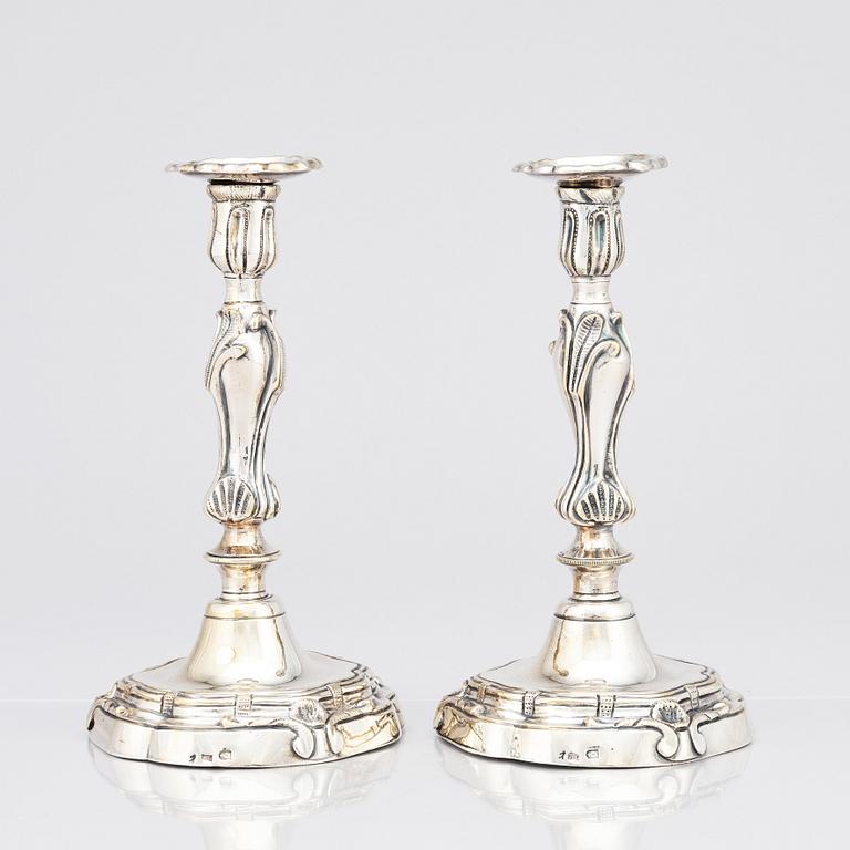 A pair of Rococo candlesticks by Stephen (Friedrich) T. Lemair, (privilge in Stockholm 1762), 1763.