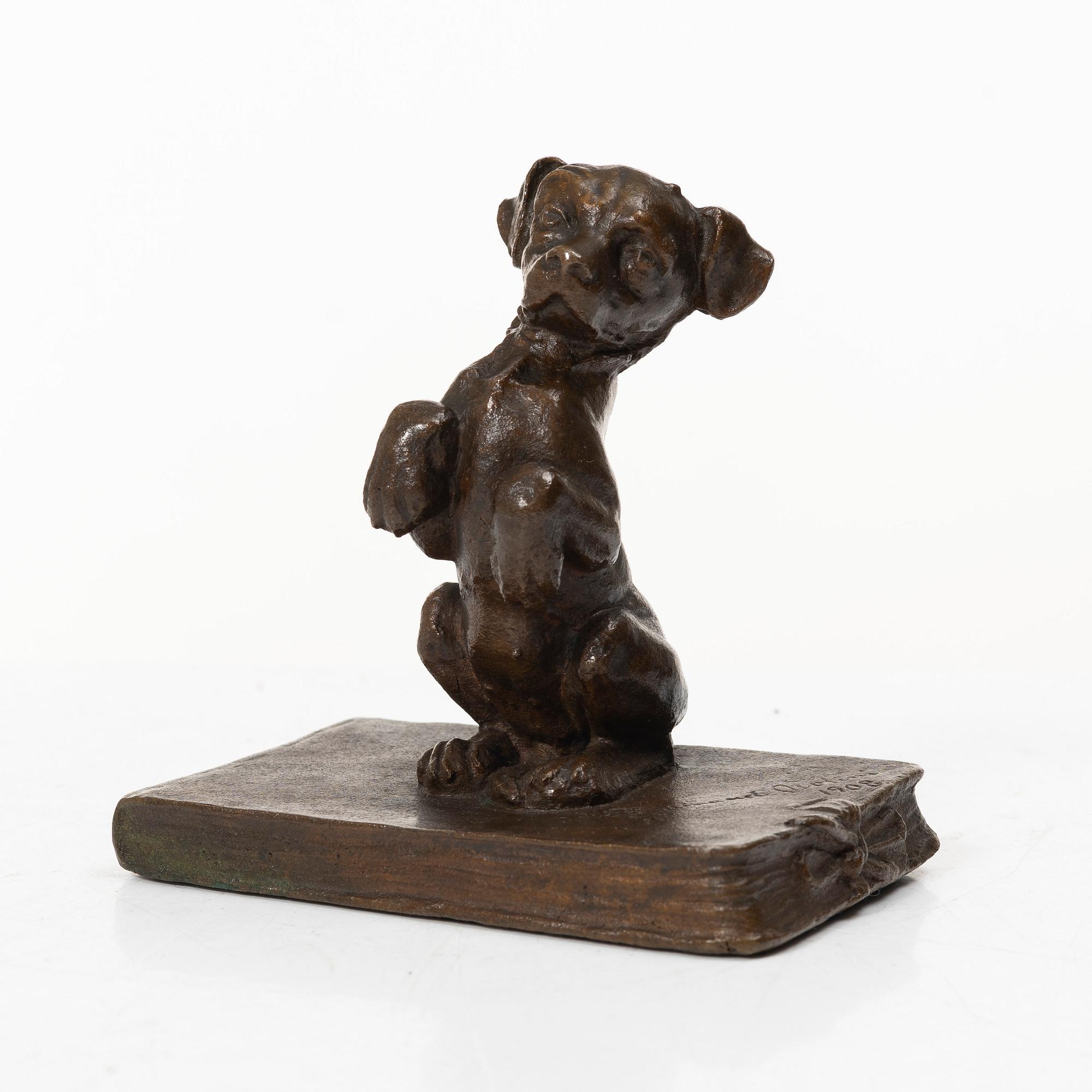 Ferdinand Notini, a bronze sculpture/paper weight, signed, 1908.