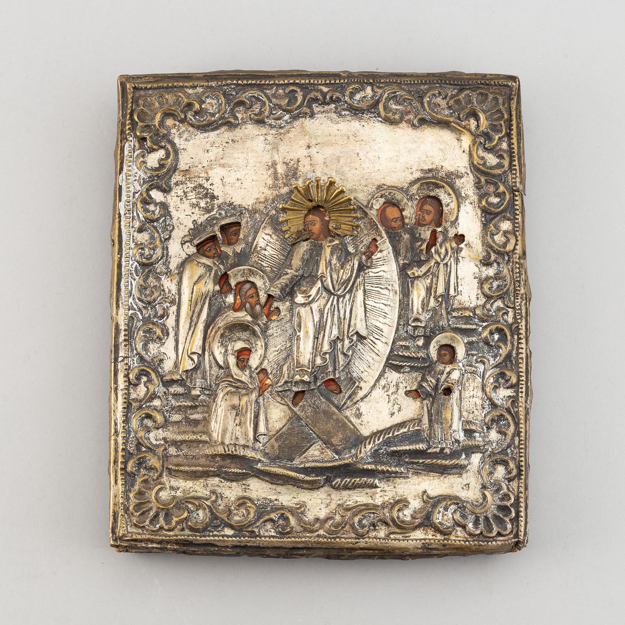 A russian icon with ochlad, rempera on panel, 19th Century.