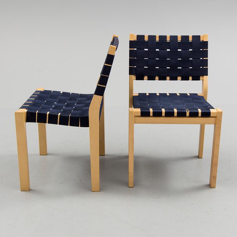 Four of Alvar Aalto birch tree and canvas chairs, model 611 by Artek.