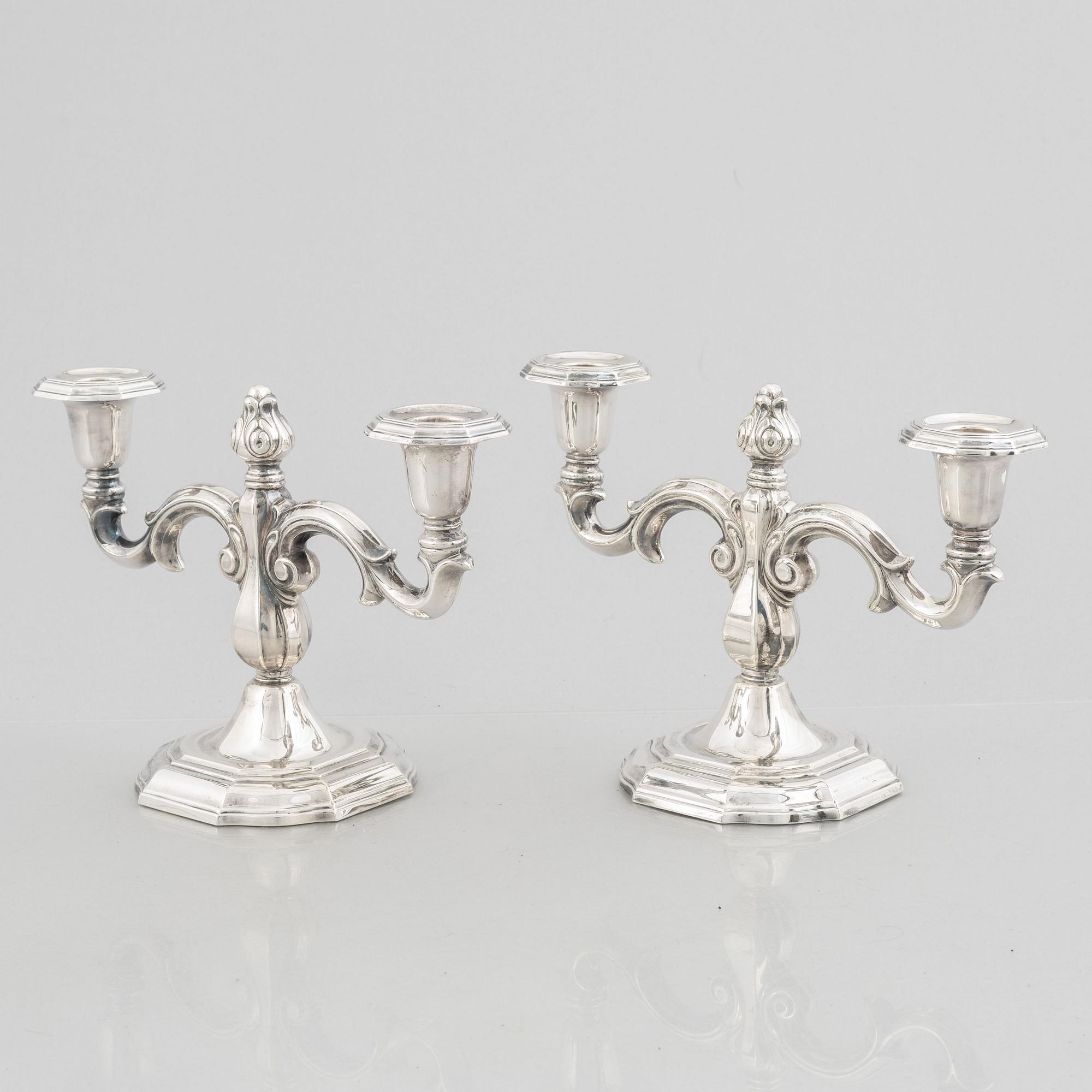 A pair of Swedish silver candelabras, marks of CG Hallberg, Stockholm 1959.