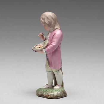 A Höchst porcelain figure of a boy, 1770's.