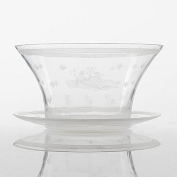 Edward Hald, a 'Flygande Mattan' engraved glass bowl with stand from Orrefors, Sweden 1928.