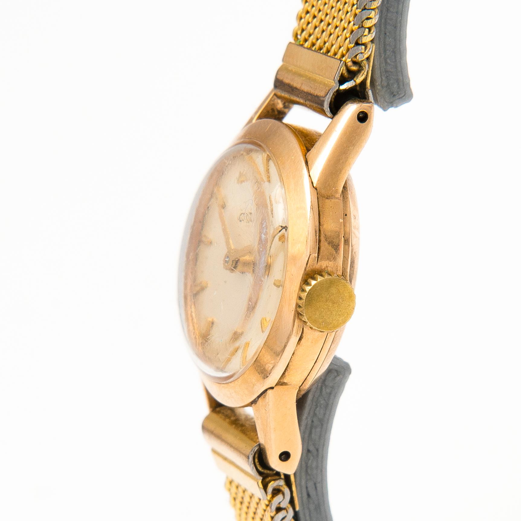 OMEGA wrist watch, manual winding, 14K gold and steel, 20 mm.