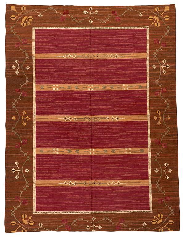 A carpet, flat weave, c 360 x 270 cm, possibly by Handarbetets vänner, Stockholm, Sweden.