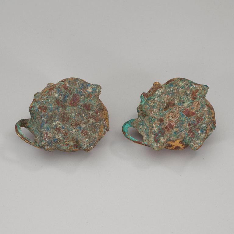 Two archaistic bronze weights, China.