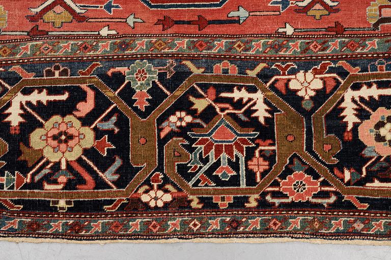 A carpet, antique Heriz, a so-called Serapi, ca 360 x 321 cm.