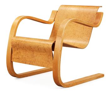 An Alvar Aalto birch armchair by O.y Huonekalu-ja Rakennustyötehdas A.B,