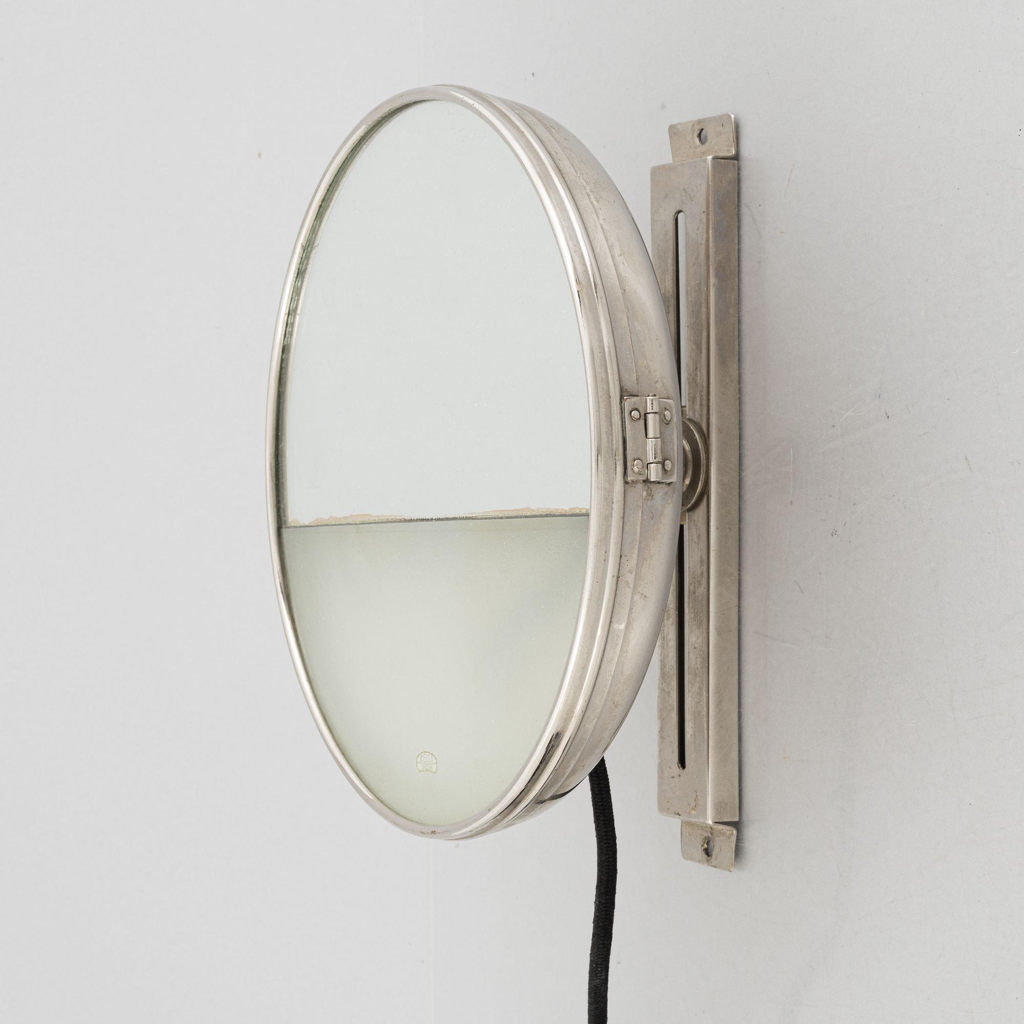 Marcel Breuer, an illuminated mirror, Zeizz Ikon AG Goerz-Werk, Germany, 1930's.