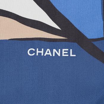 A silk scarf by Chanel.