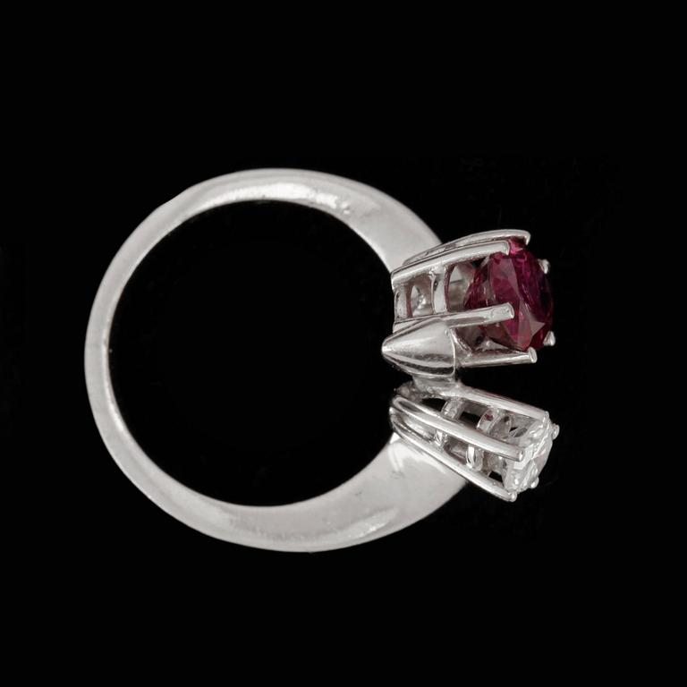 A ruby, circa 2.00 cts and diamond, circa 0.37 ct, ring. Carat weight according to engraving.
