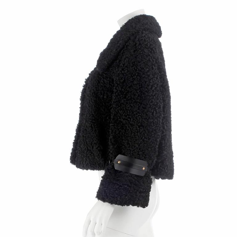 GUCCI, a black persian lamb jacket, size 40.