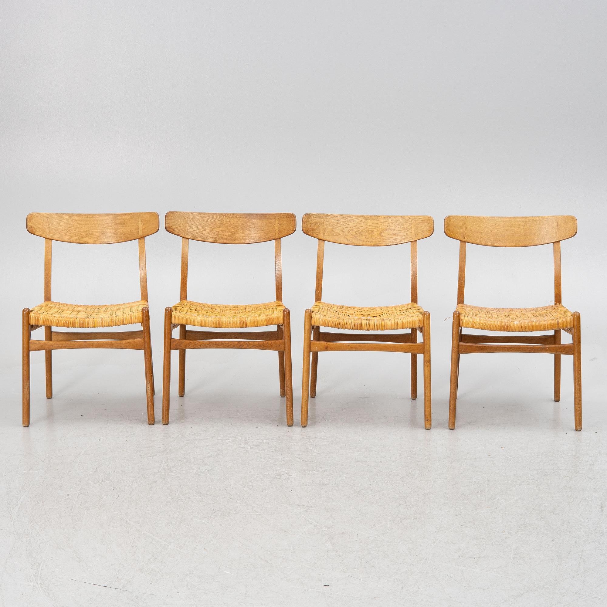 Hans J.Wegner, four dining chairs, model "CH-23",, Denmark, second half of the 20th century.