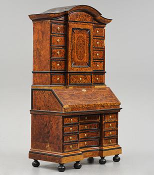 A Swedish burr-elm late baroque writing cabinet, first part 18th century.