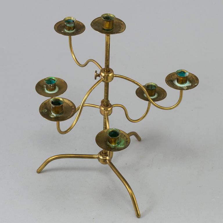 A brass kandelabra model 2454 by Josef  Frank for Firma Svenskt Tenn.