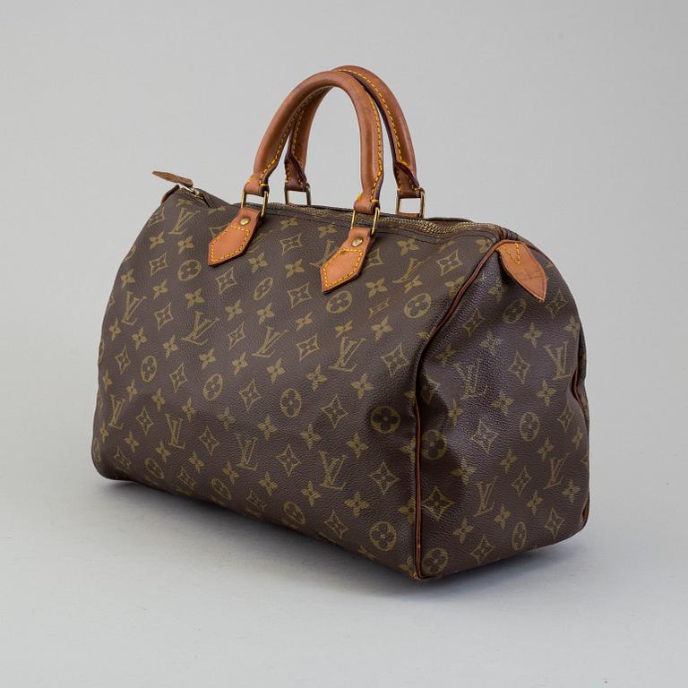 a Louis Vuitton "Speedy 35" bag.