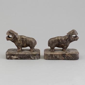 A pair of stone book ends, early 20th century.