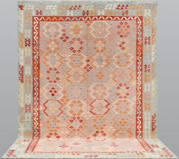 A Kilim carpet, approx. 342 x 255 cm.