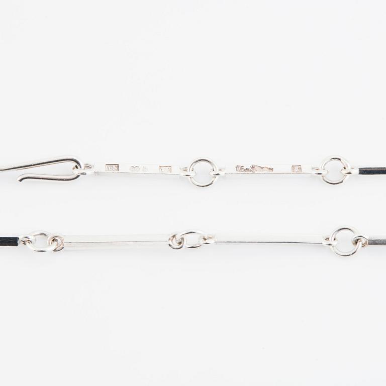 Wiwen Nilsson, a silver necklace set with faceted rock crystal, Lund 1973.