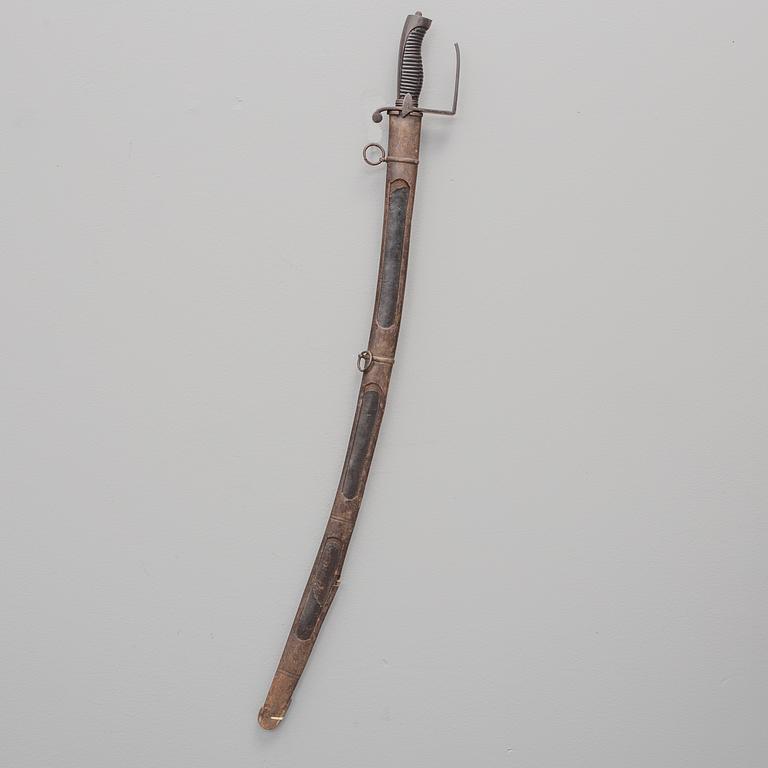 A british sabre with scabbard circa 1800.
