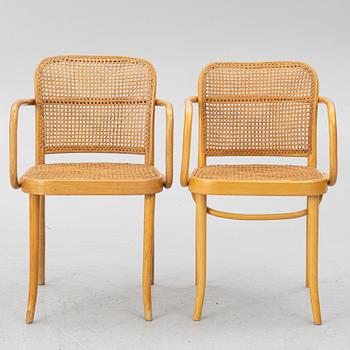 A matched pair of armchairs from Thonet, circa 1900 and late 20th Century.
