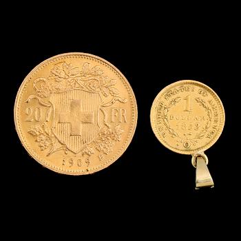 GULDMYNT, 2 st, 20 franc, Schweiz, 1909 samt 1 dollar, USA, 1853. Vikt ca 8 g.