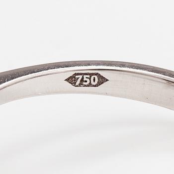 An 18K white gold ring with a ruby and diamonds ca. 0.36 ct in total.