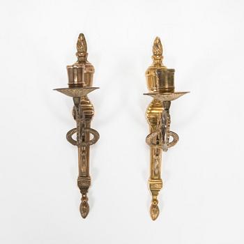 A pair of 'Törne' brass one-light wall ligths from IKEA's 18th Century collection.