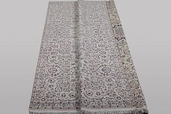 A carpet, Nain, part silk, ca 341 x 245 cm.