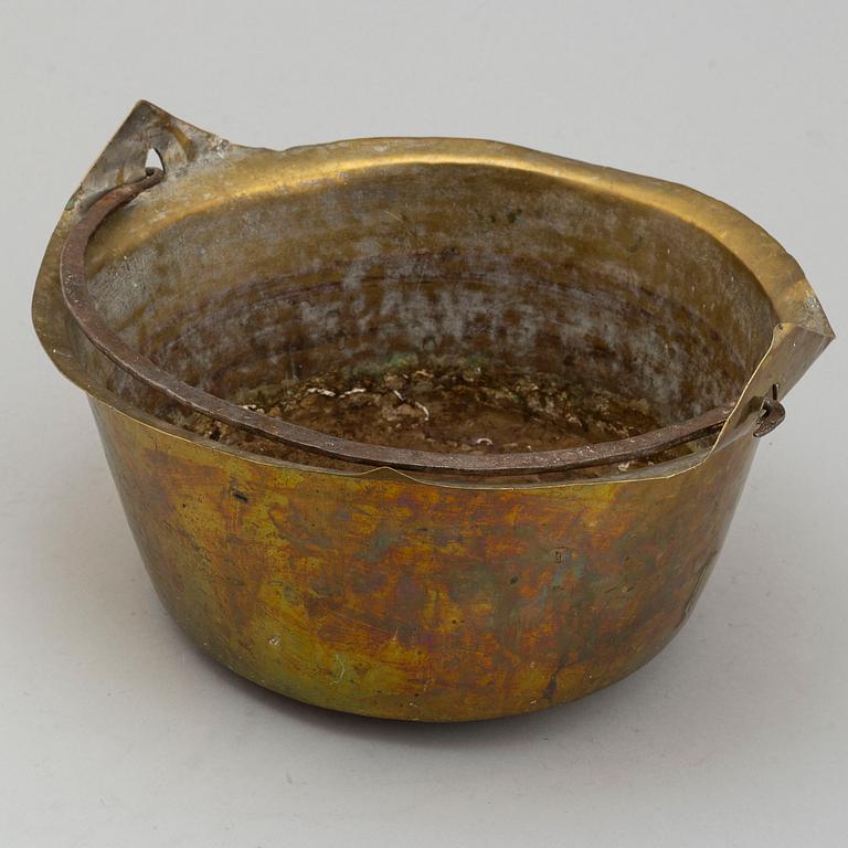 A 18th/19th century brass cauldron.