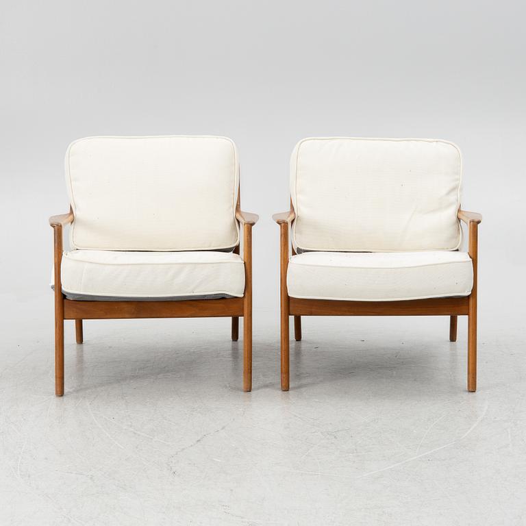 Folke Ohlsson, a pair of "USA 75" armchairs, Dux 1960s.