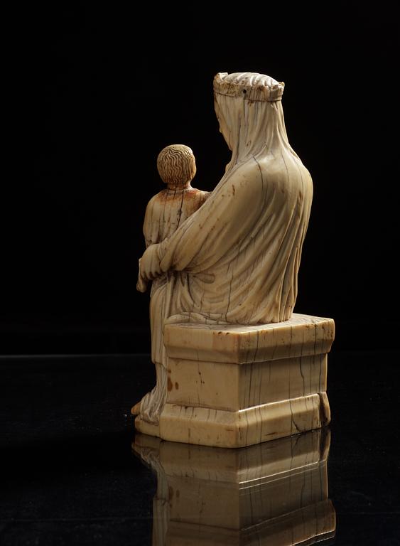 Virgin and Child, a French Gothic ivory statuette, second half of the 13th century.