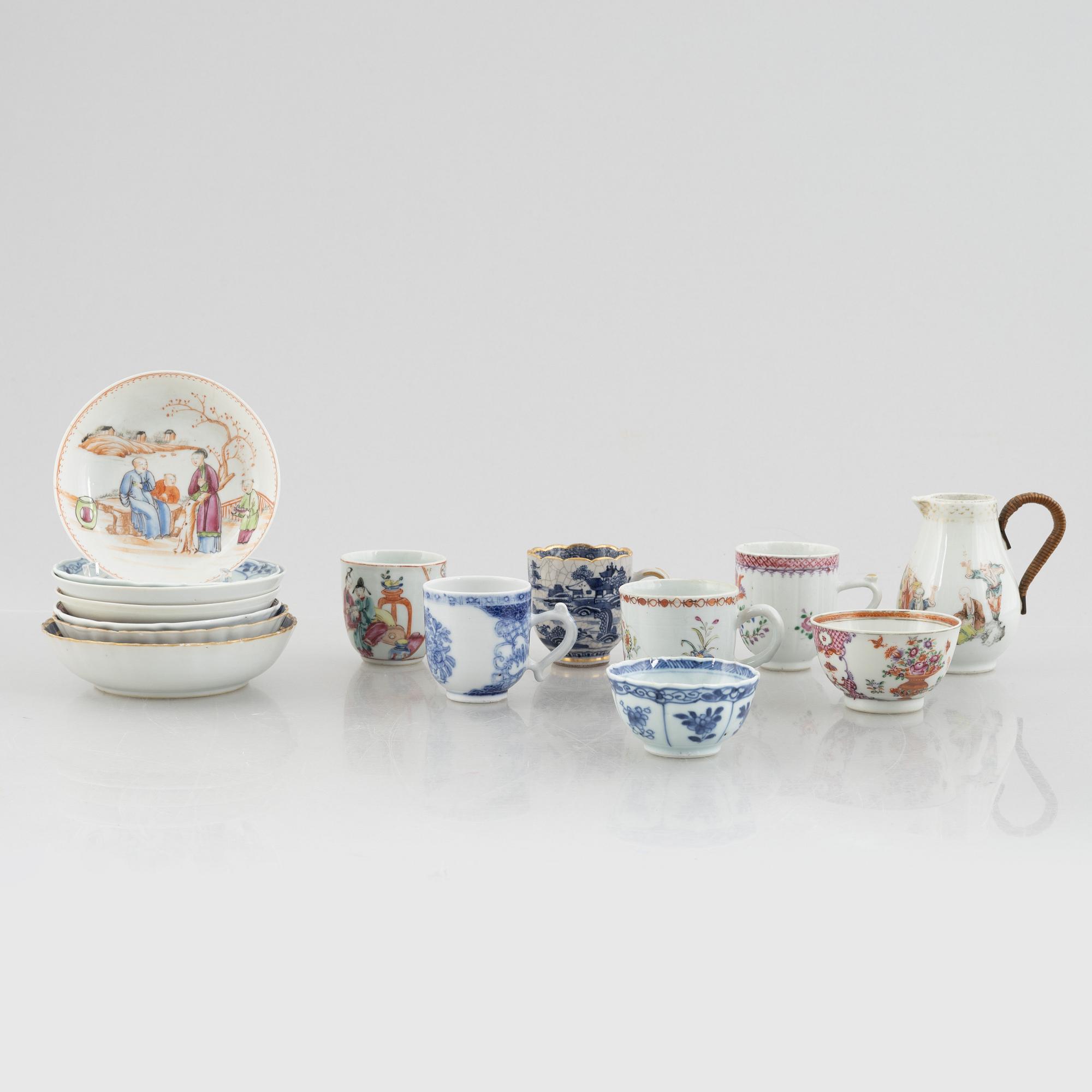 A creamer, seven porcelain cups and seven saucers, China, Qing dynasty, 18th century.