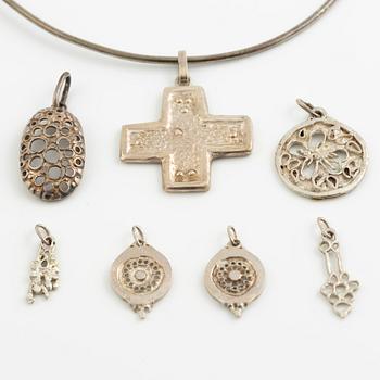 Lars Arby, a neck ring and seven pendants, silver, Gothenburg 1966, 1977 and 1982.