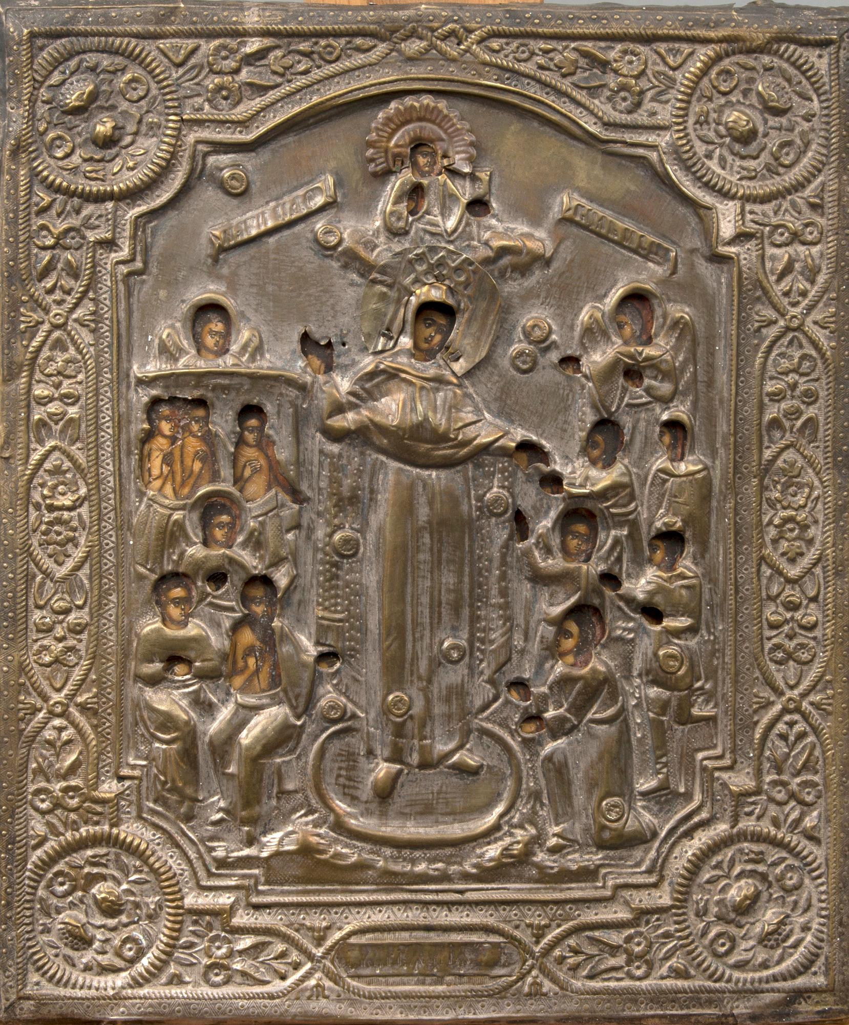 A late 190th century Russian tempera on board with brass rizza icon.
