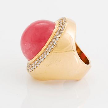 An 18K gold and rhodochrosite Acchinelli ring set with round brilliant-cut diamonds.