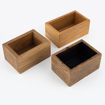 Magnus Ek, three oak wood cutlery boxes for Oaxen Krog.