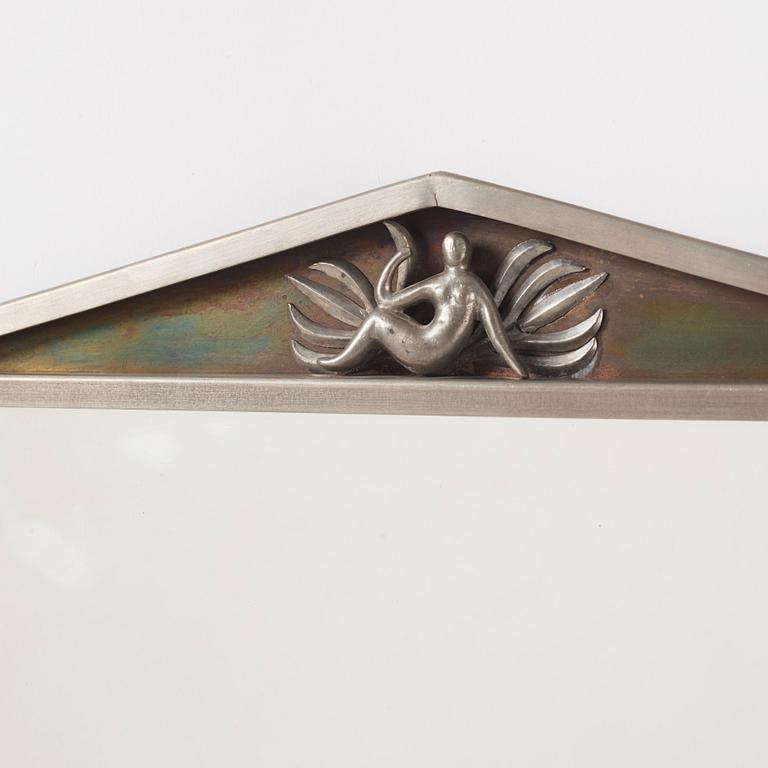 Nils Fougstedt, a Swedish Grace pewter and brass mirror model "137 a", Firma Svenskt Tenn, Stockholm 1927.