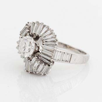 A Boucheron platinum ring set with a round brilliant-cut diamond weight ca 1.25 cts quality ca H vvs.