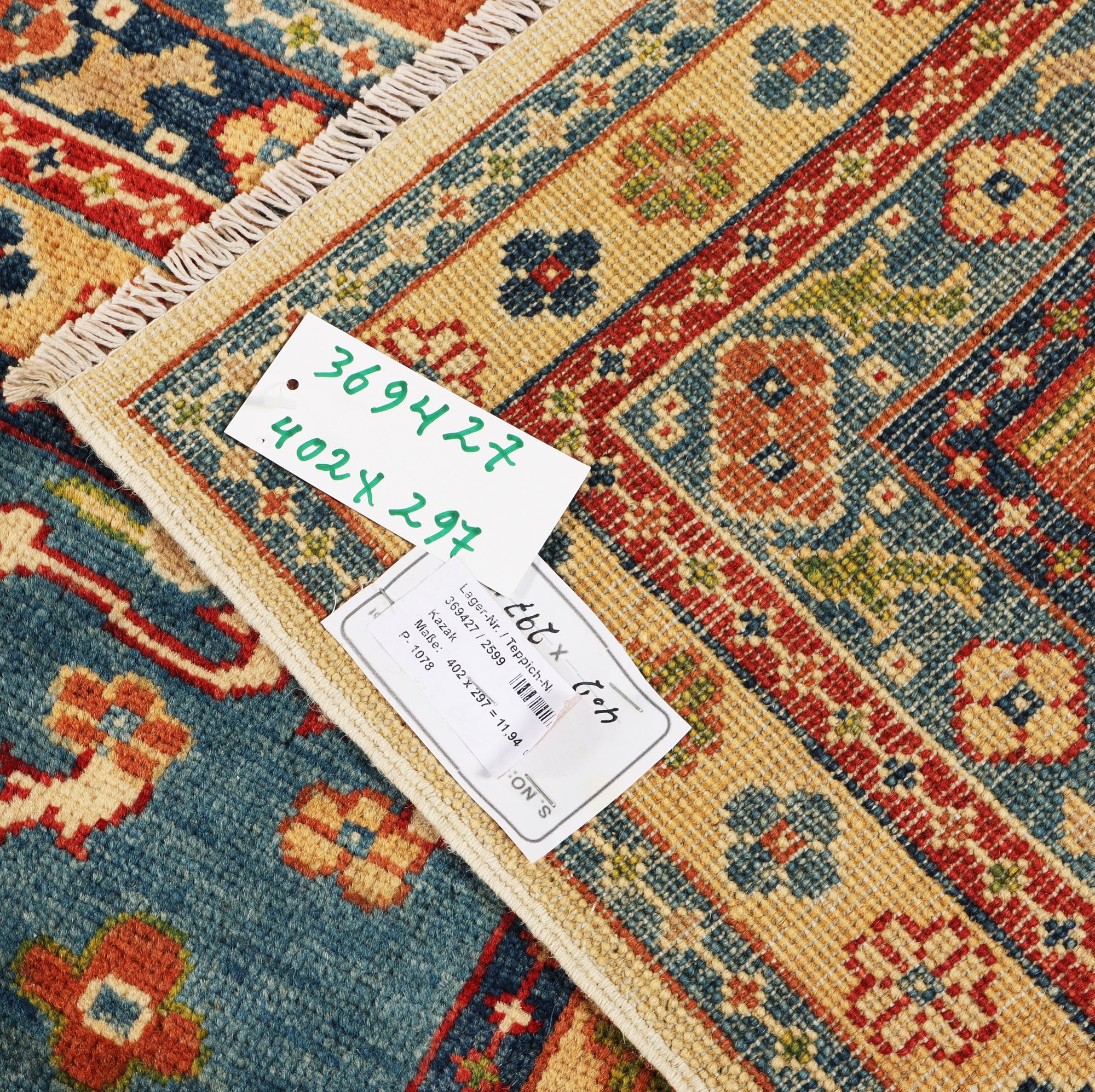 A Kazak carpet, c. 402 x 297 cm.