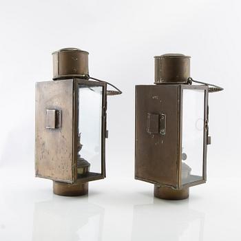 Skottlyktor ett par 1900-talets första hälft.