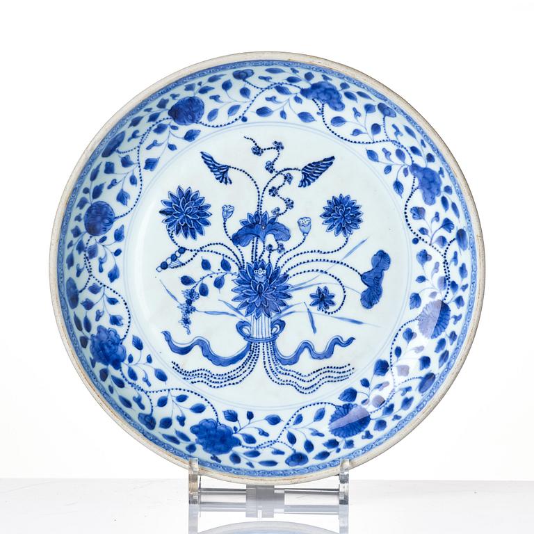 A blue and white ming-style 'lotus bouquet' dish, Qing dynasty, 18th century.
