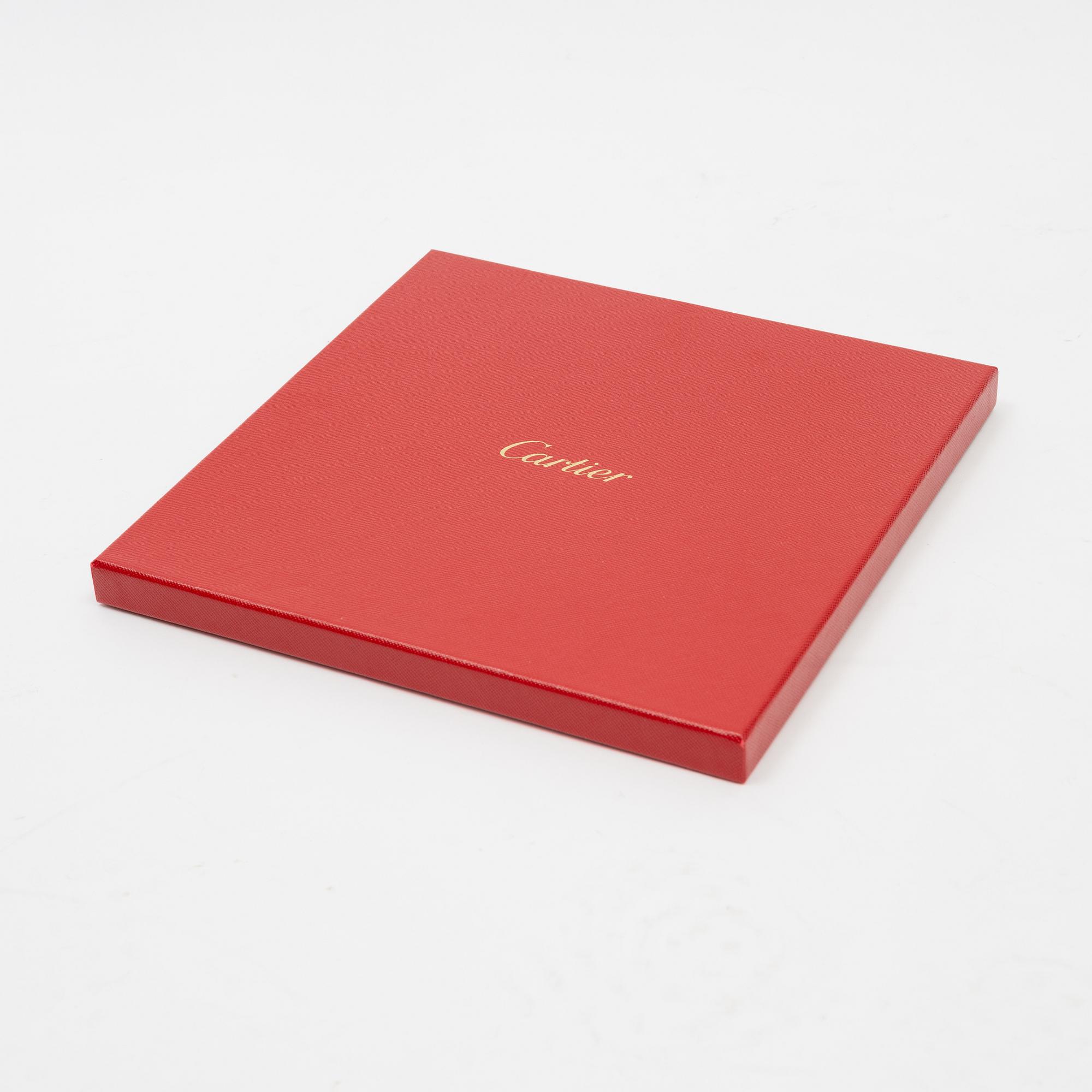 Cartier, a silk scarf.