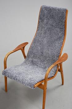 FÅTÖLJ MED FOTPALL. "Lamino", Yngve Ekström.