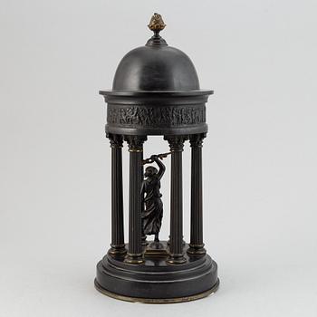 A stone and brass table decoration, late 19th century.