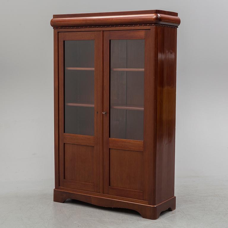 A first half of the 20th century mahogany veneered display cabinet.