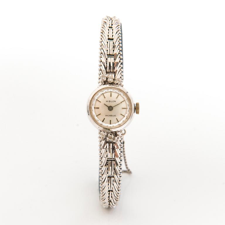 HILSON armbandsur, manual winding, 14K vitguld diamanter ca 0.11 ct tot, 16 mm.